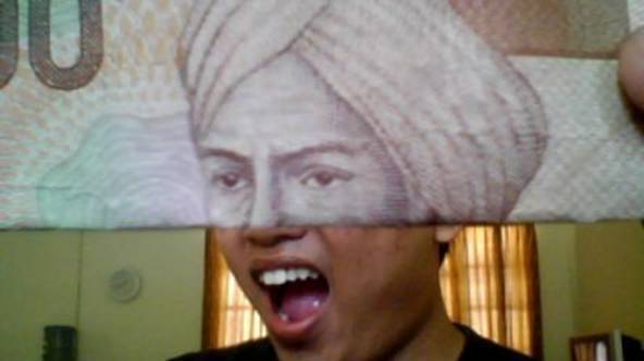 Uang 5000 sebagai pecahan yang harus disimpan