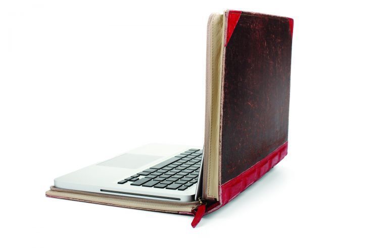 Softcase laptop dengan desain buku tua