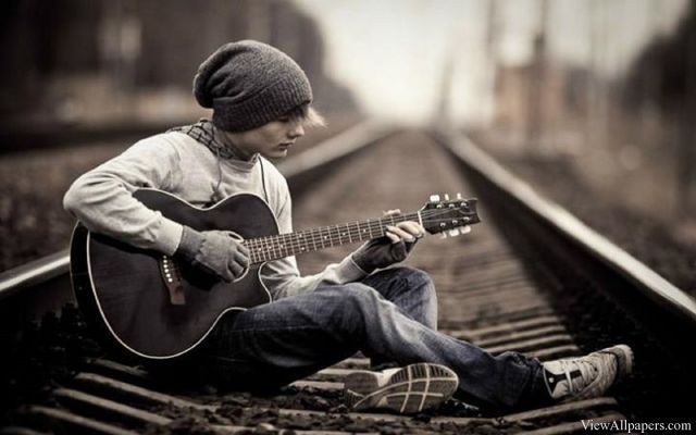 Boy playing guitar