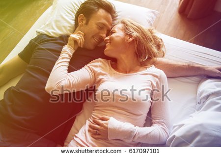 couple-lover-laying-on-bed-happiness