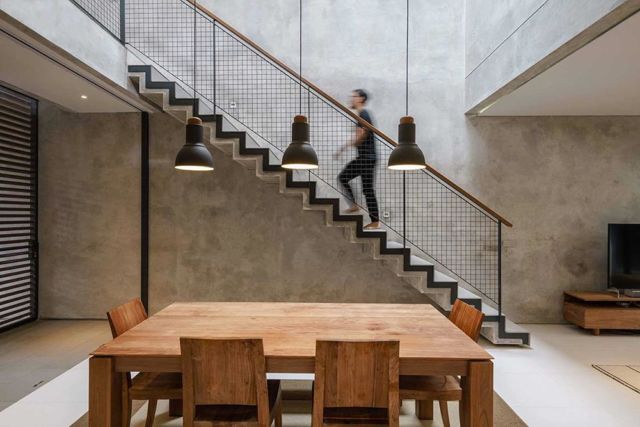 Desain interior maskulin RUMAH SELA di Jakarta karya ArMSchitecture